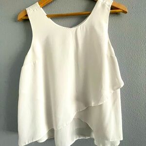 Atmosphere white flowy sleeveless tank top.